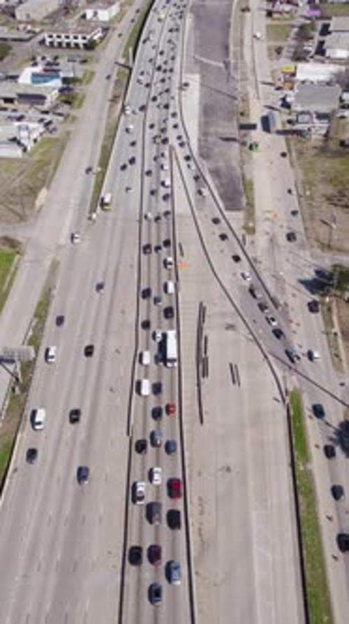 Vertical Aerial View of Busy Highway Traffic in South Houston Texas USA, Revealing Drone Shot