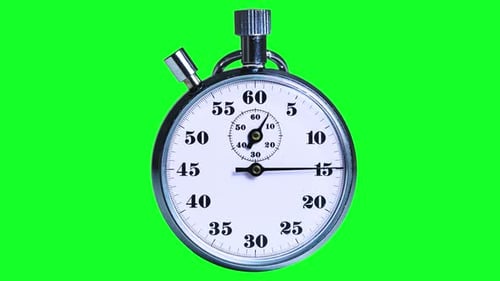 Classic metallic chrome mechanical analog stopwatch isolated on green background for chroma key.