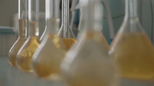 Close Up of Glass Flasks in Laboratory Equipment for Elemental Analysis of Samples