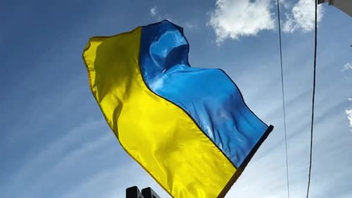 Blue and Yellow Flag Waving in the Wind