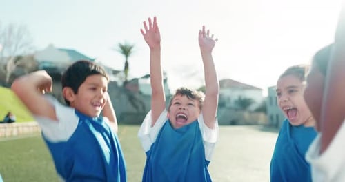 Happy Children Soccer Team Celebrate Together on Field
