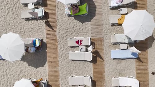 Aerial View Red Swimsuit on a Lounge Chair By the Beach Relaxing Vibe Under the Sun