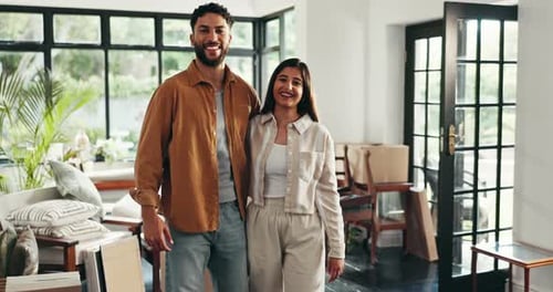 Happy Couple Embraces in New Home
