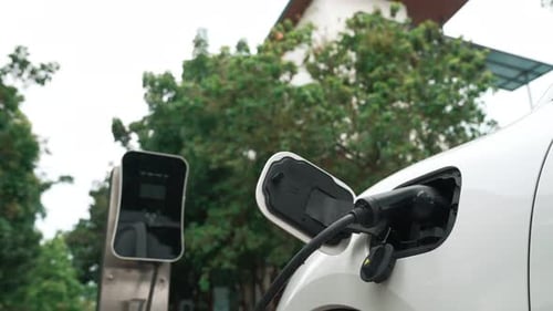 Progressive Concept of Electric Car Parking and Recharging at Charging Station