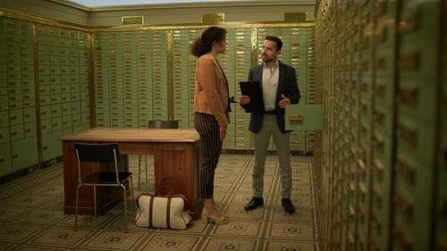 Two Colleagues Discuss Business in a Bank Vault
