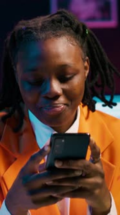 Vertical Video College Student Doing Her Homework at Laptop and Texting on Phone