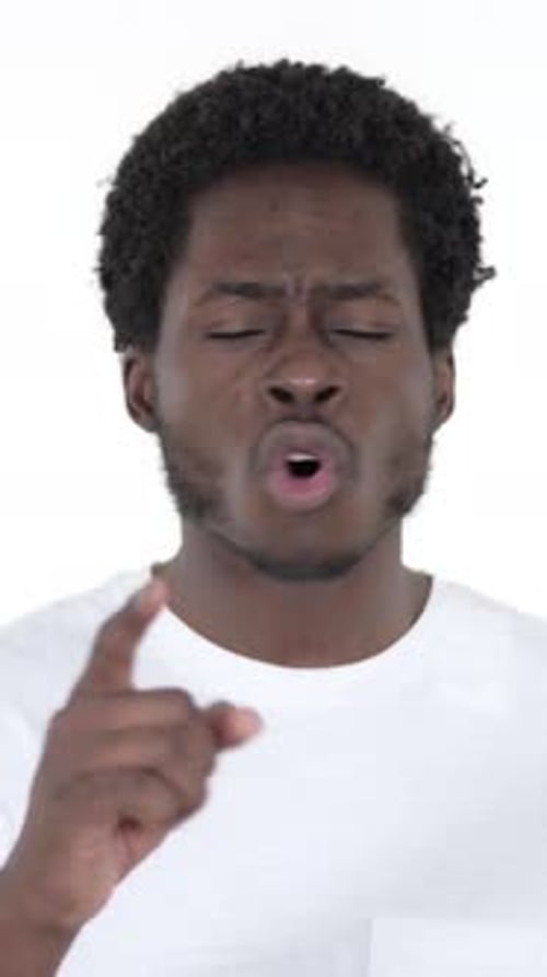 Angry Young Man Shouting and Pointing Finger