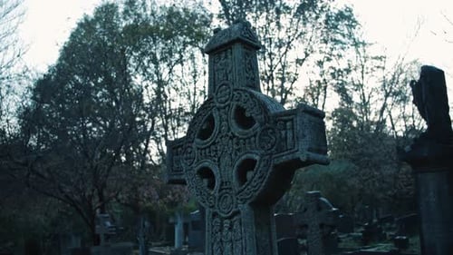 A decorated gothic cross from a grave in an english cemetery