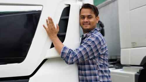 Indian Trucker Hugging His Truck Vehicle for Transportation Asian Truck Driver Loving His Job