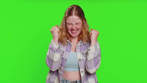 Excited Woman Gesturing Positively on Green Screen