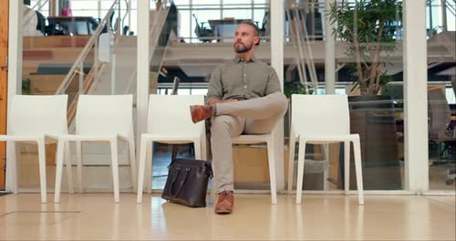 Business, man and nervous for job interview, watch and guy in modern office, impatient and stress