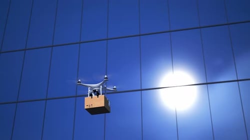 Flying On A Sky Delivery Drone With Cardboard Parcel Through City