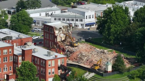Demolition of Old Residential Building Crawler Excavator Demolishing Brick Walls of Outdated