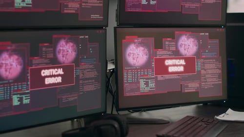 Computer Monitors Displaying Critical Error Message