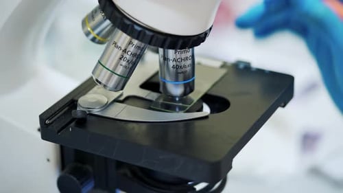 Part of microscope. Close-up. Modern equipment for research works. New microscope in the laboratory.