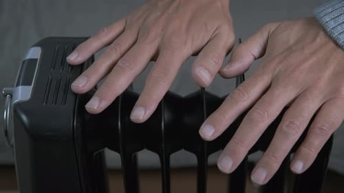 Warm Up your Hands on an Electric Radiator