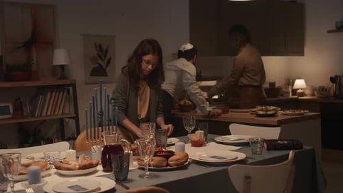 Family Prepares for Religious Celebration at Home