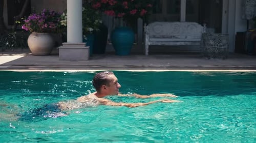 Man Swims Private Pool Luxury Villa Male Embraces Active Lifestyle Swimming Private Pool Afforded
