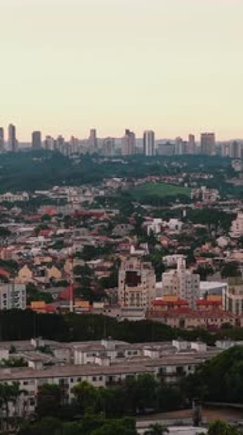 Curitiba sunset view in Parana Brazil with the sun dropping below the Curitiba horizon