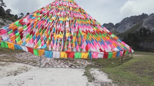 Colorful Tibetan Prayer Flags Fluttering In Himalayan Mountain Landscape