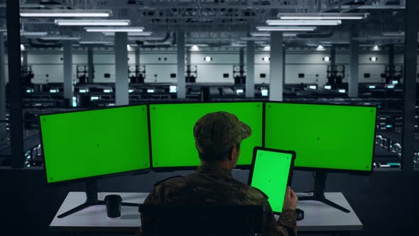 Asian Military Working With Tablet And Computer Monitor With Mock Up ...