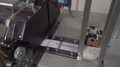 Pieces Of Cut Cards Released From Cutting Machine In Printing Factory. closeup