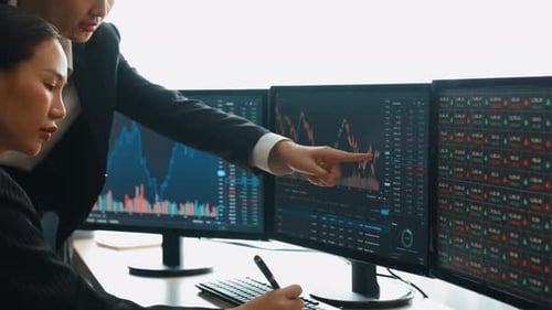 Slow motion business investor in stock trade company look at monitor. Burgeoning