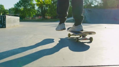 Close-up of skateboarder practicing tricks