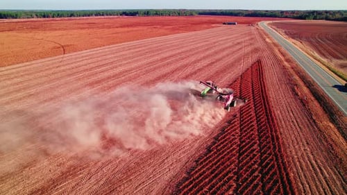 Dusty Combine Harvesting Soy Field, Georgia, Usa. Aerial top view