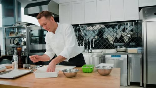 Chef Prepares Food in Commercial Kitchen