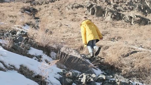 a Teenage Boy Climbs the Mountain in Winter Hiking in the Mountains Hiking Trail