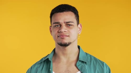 Young Man Portrait on Yellow Background
