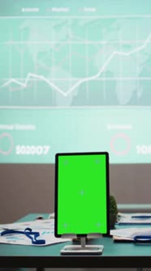 Vertical Video Empty Copy Space on Device in the Boardroom with Charts on Projection Board