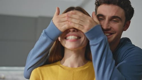 Happy Couple Celebrate Romantic Surprise Indoors