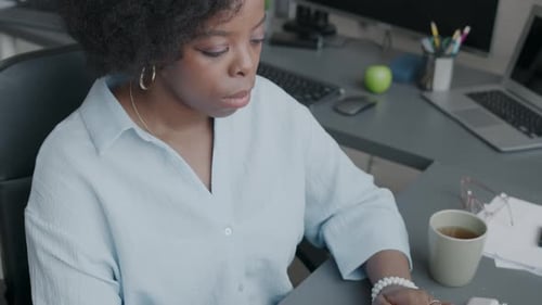 African American Female Programmer at Workplace