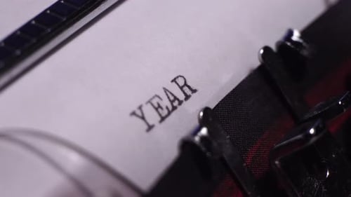 Year 1910, Typing on White Paper in Vintage Typewriter, Close Up