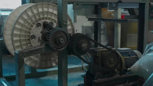 A Mechanism with Rotating Gears Creative Industrial Background at the Workshop