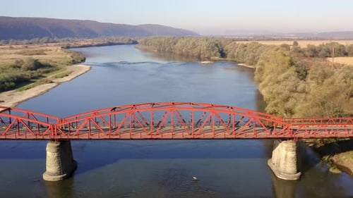 Beautiful Countryside Landscape with Waterscape and Autumn Forest Around