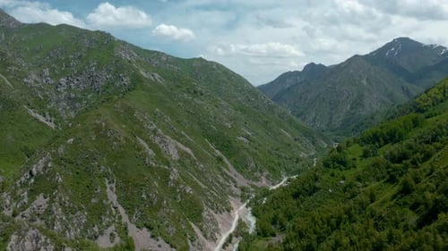 Aerial View of Lush Green Mountain Valley
