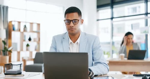Office, happy and business man with laptop at desk for research proposal