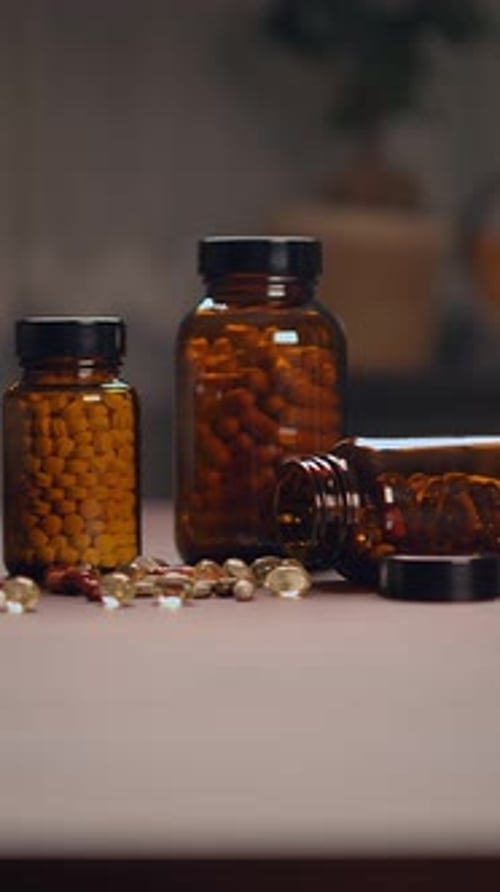 Medicine Pills in Glass Bottles
