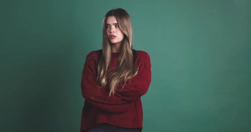 Angry Young Beauty Woman Standing with Arms Crossed