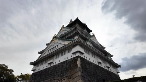 Osaka Castle Surrounded By Moat and Autumn Foliage