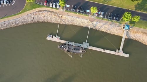 Aerial descending overhead shot of the Pinta replica, docked on the Cumberland River
