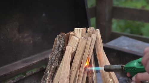 Lighting Wood in Grill with Gas Torch