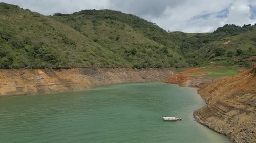 Aerial Lake Turquoise Water. Low Level. Dolly Forward Lake Calima. Valle del Cauca. Colombia
