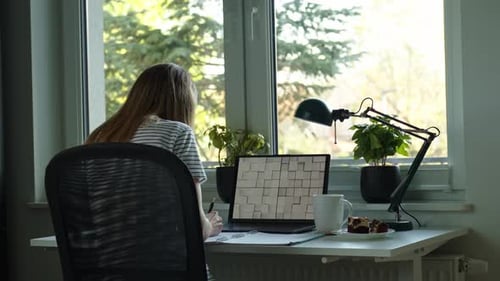 Woman Working Remotely at Home Office Use Laptop
