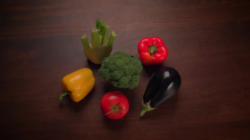 A Variety of Fresh Colorful Vegetables Beautifully Arranged on a Wooden Table Surface