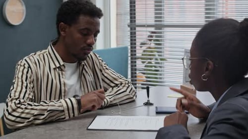 Business Meeting with Woman and Man in Office