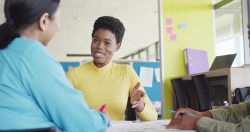African american business people having meeting at office, slow motion